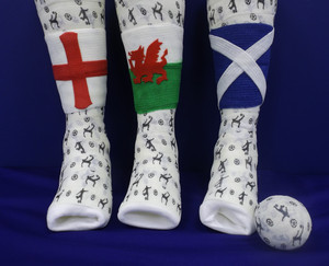 Three leg casts with England, Wales and Scotland flags on the front
